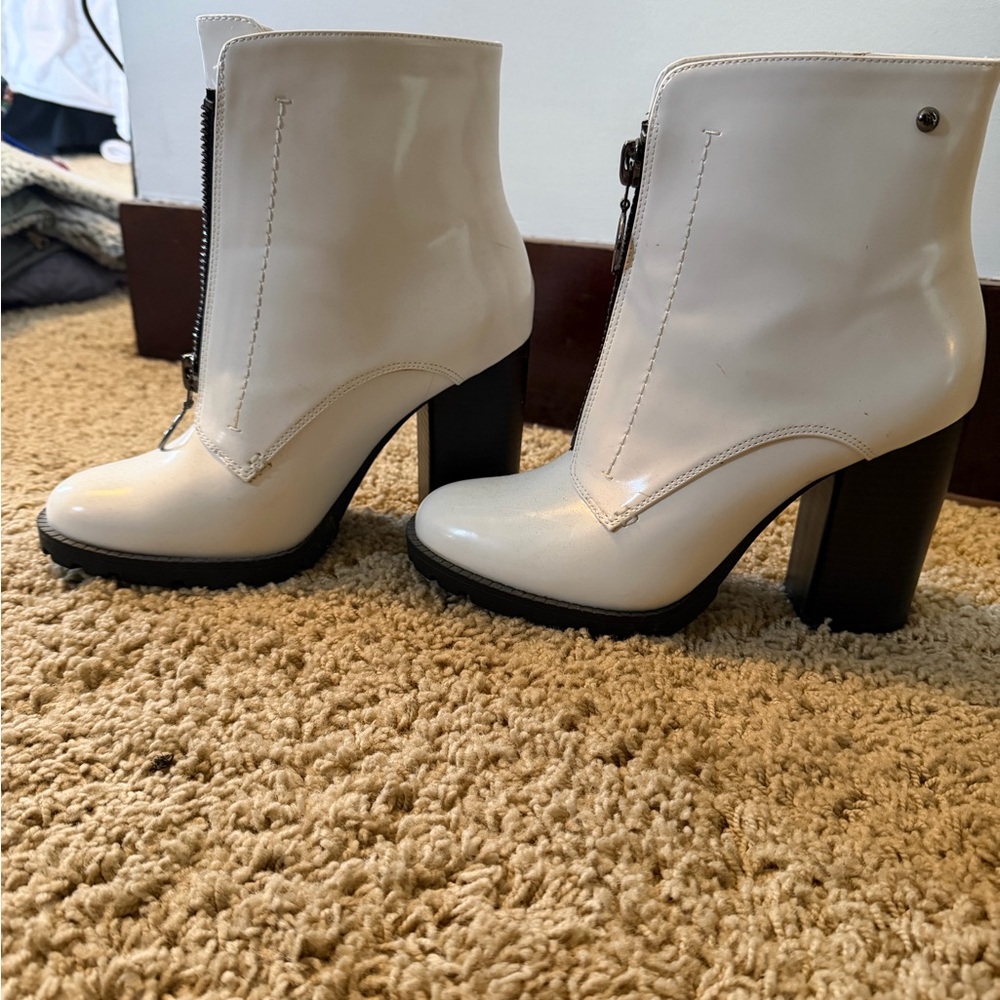 Heeled white booties